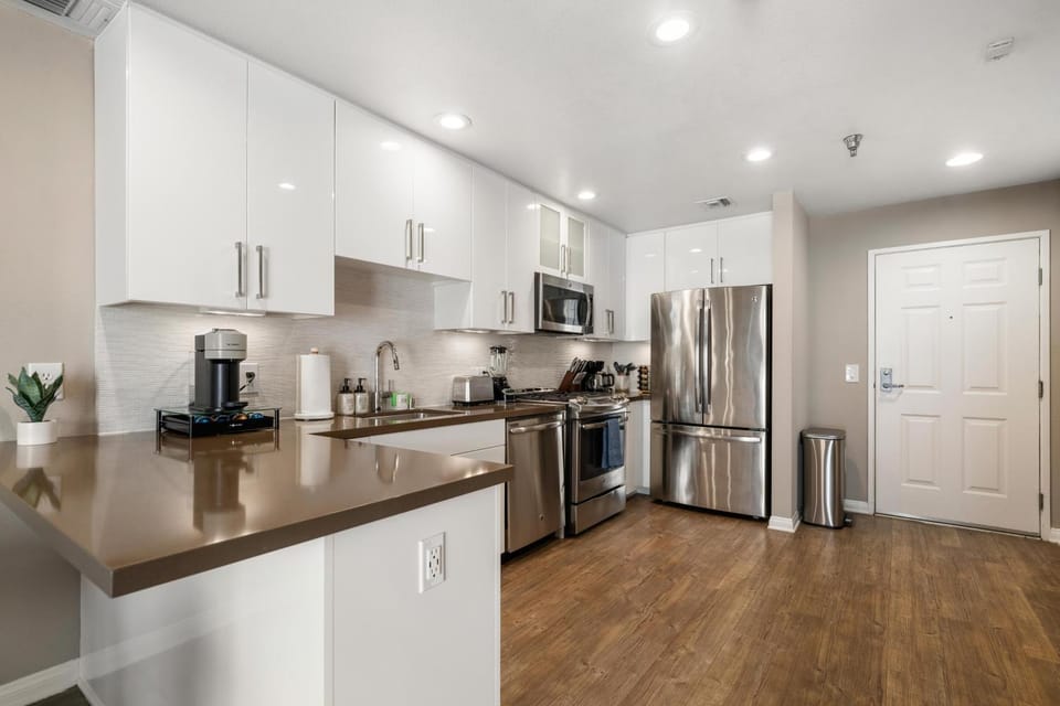 Kitchen or kitchenette, dishwasher, oven, stove, toaster