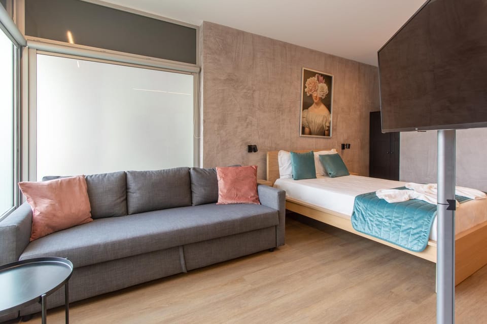 Bed, Living room, Seating area, Bedroom
