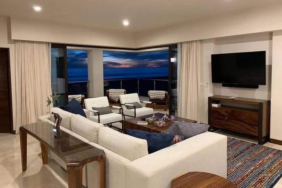 TV and multimedia, Living room, Seating area, Evening entertainment, Sea view, Sunset