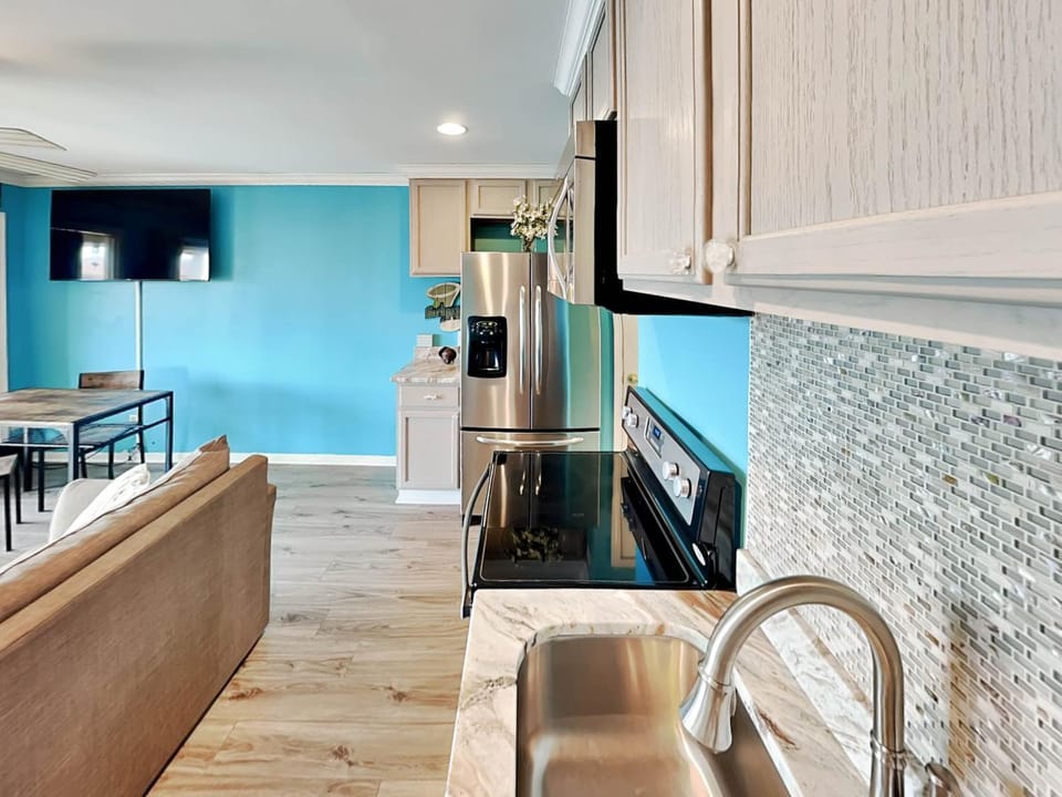Kitchen or kitchenette, Living room, Seating area, furniture, oven