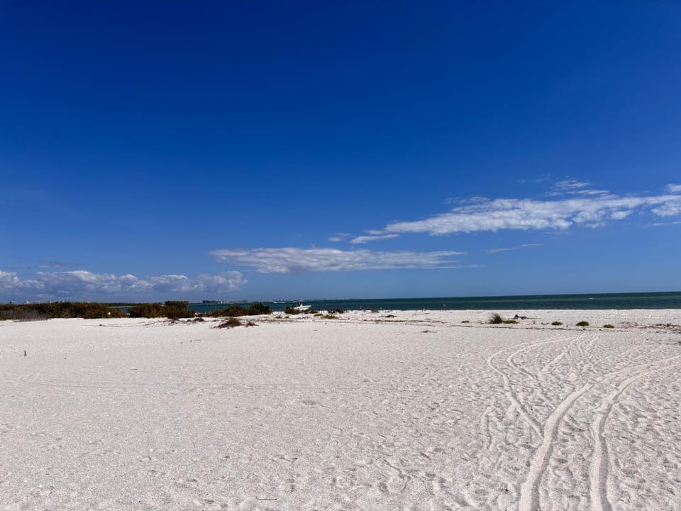 Go to the beach from expansive heated pool home House in Estero Island