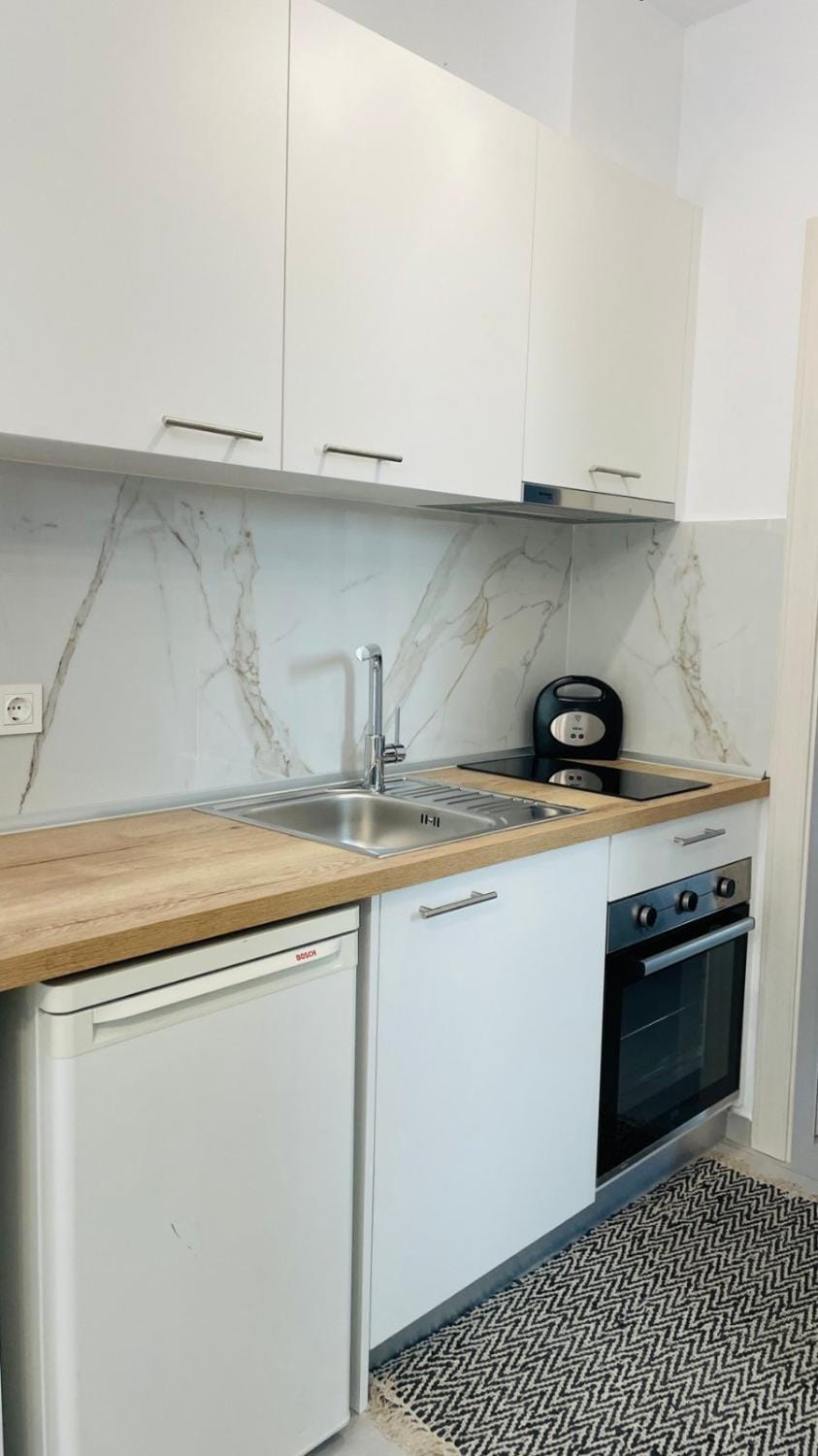 Kitchen or kitchenette, stove