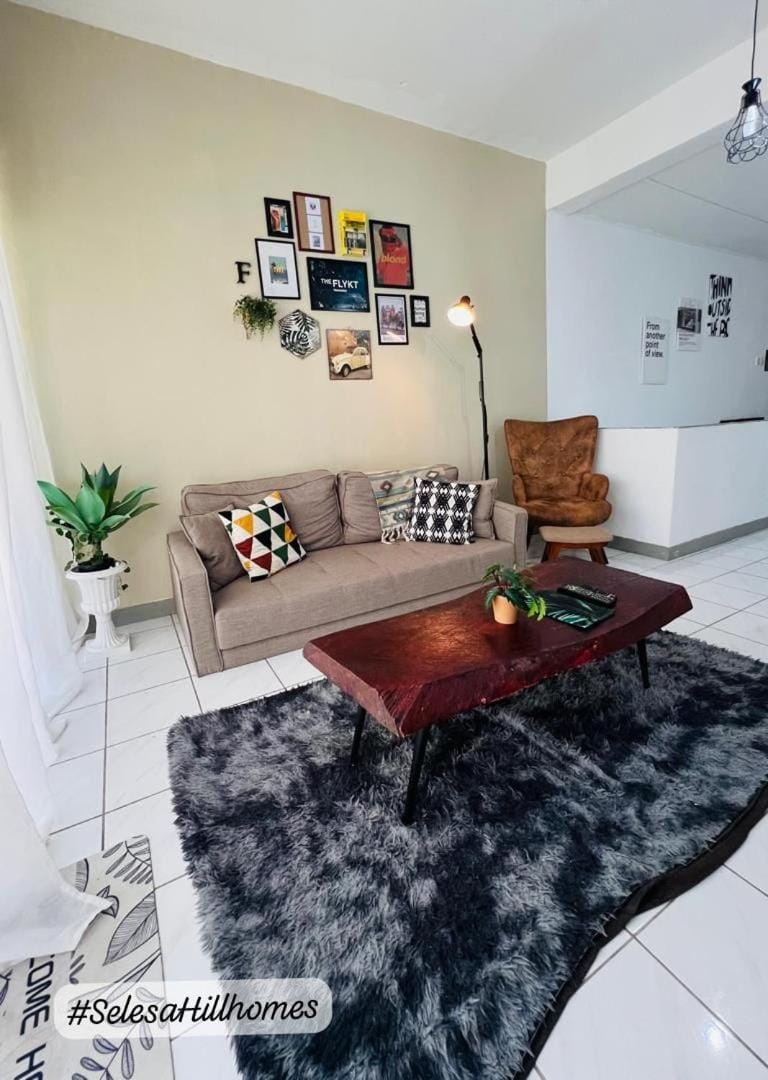 Property building, Living room, Seating area, fireplace