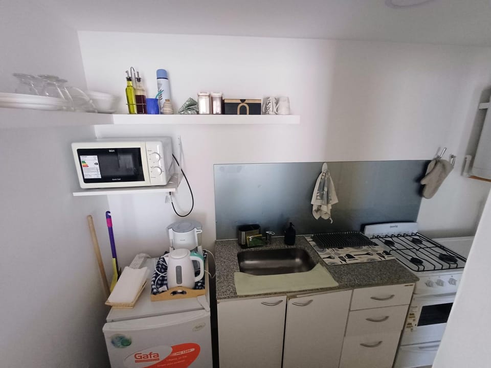Kitchen or kitchenette, microwave