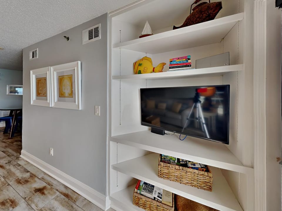 TV and multimedia, Living room, Seating area, furniture, storage, air conditioner