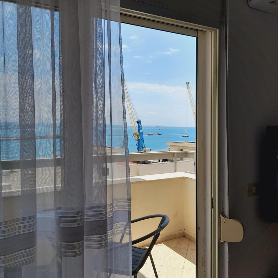 View (from property/room), Balcony/Terrace, Living room, Seating area, Sea view