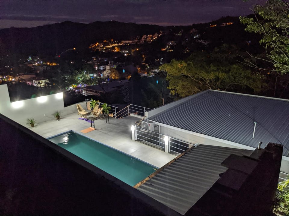 Night, View (from property/room), Mountain view, Swimming pool