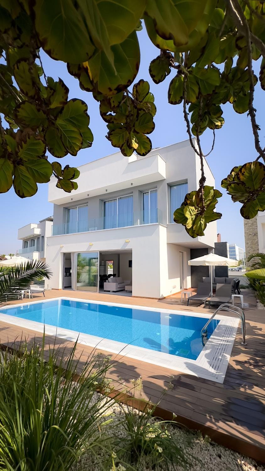 Property building, Patio, Pool view, Swimming pool, sunbed