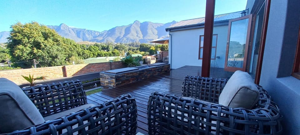 Property building, Patio, Natural landscape, View (from property/room), Balcony/Terrace, Seating area, Mountain view, Inner courtyard view