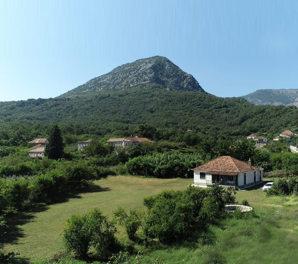 Property building, Nearby landmark, Spring, Day, Natural landscape, Mountain view