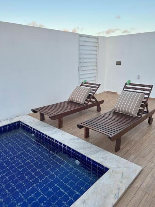 Swimming pool, sunbed