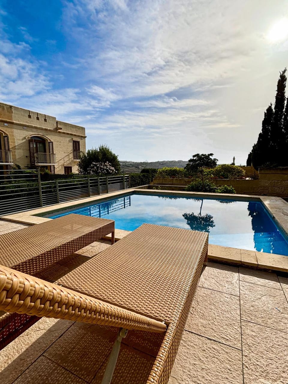 Swimming pool, sunbed