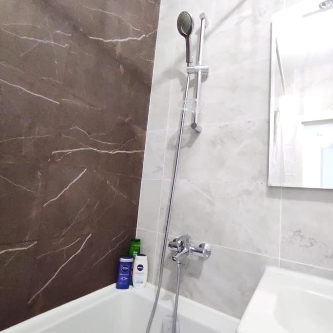 52 напротив ТРЦ MEGA возле гор Apartment in Almaty