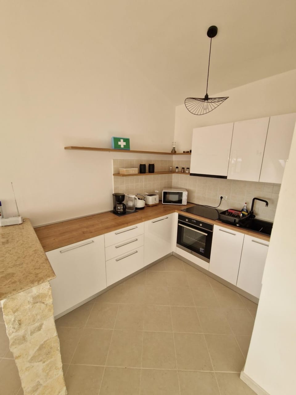 Kitchen or kitchenette, dishwasher, oven, toaster