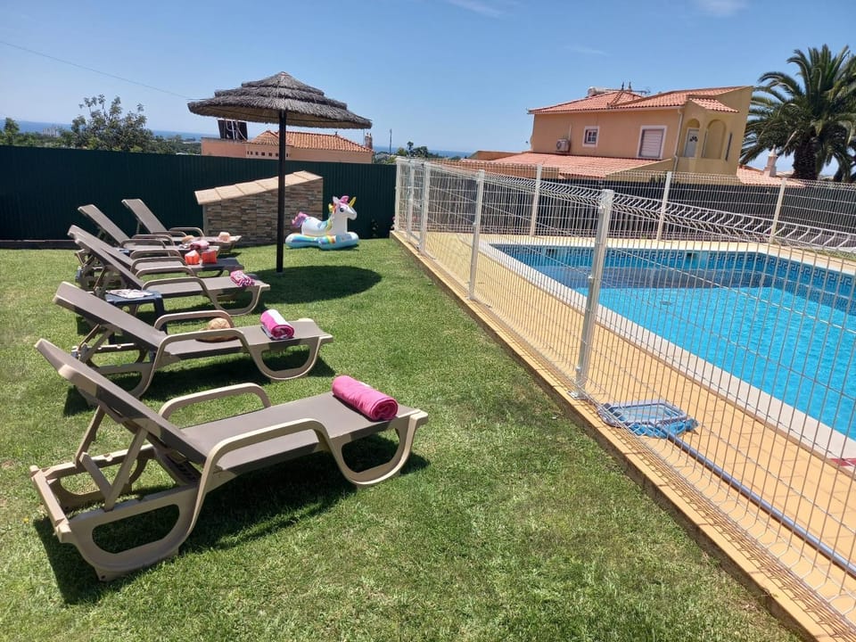 Swimming pool, sunbed