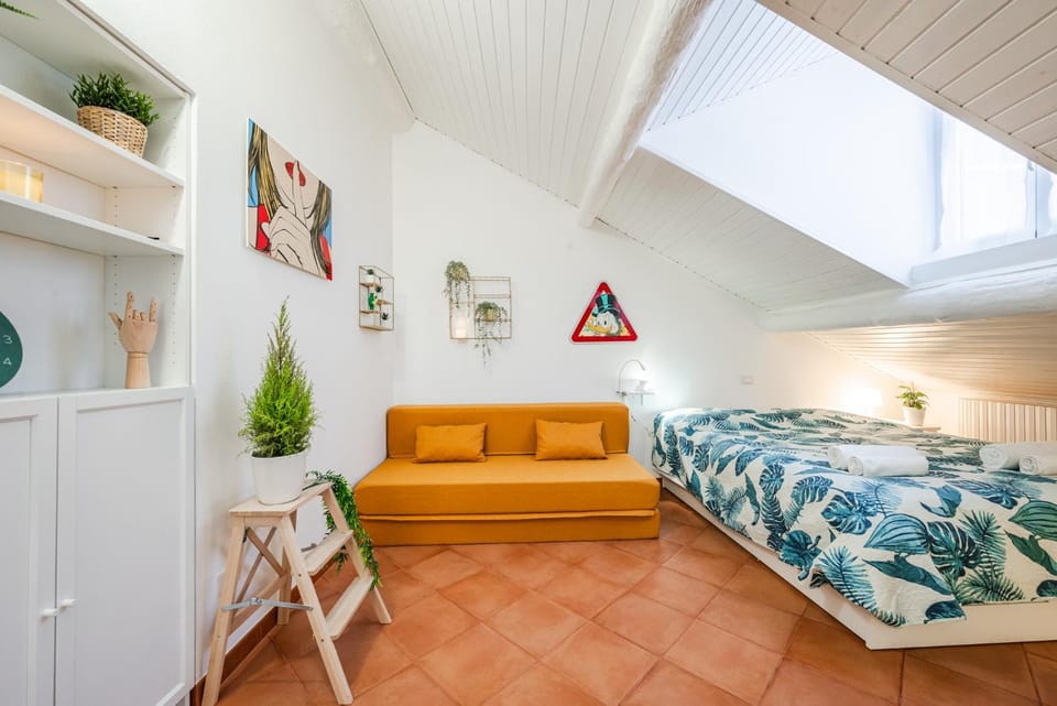 Bed, Living room, Seating area, Bedroom