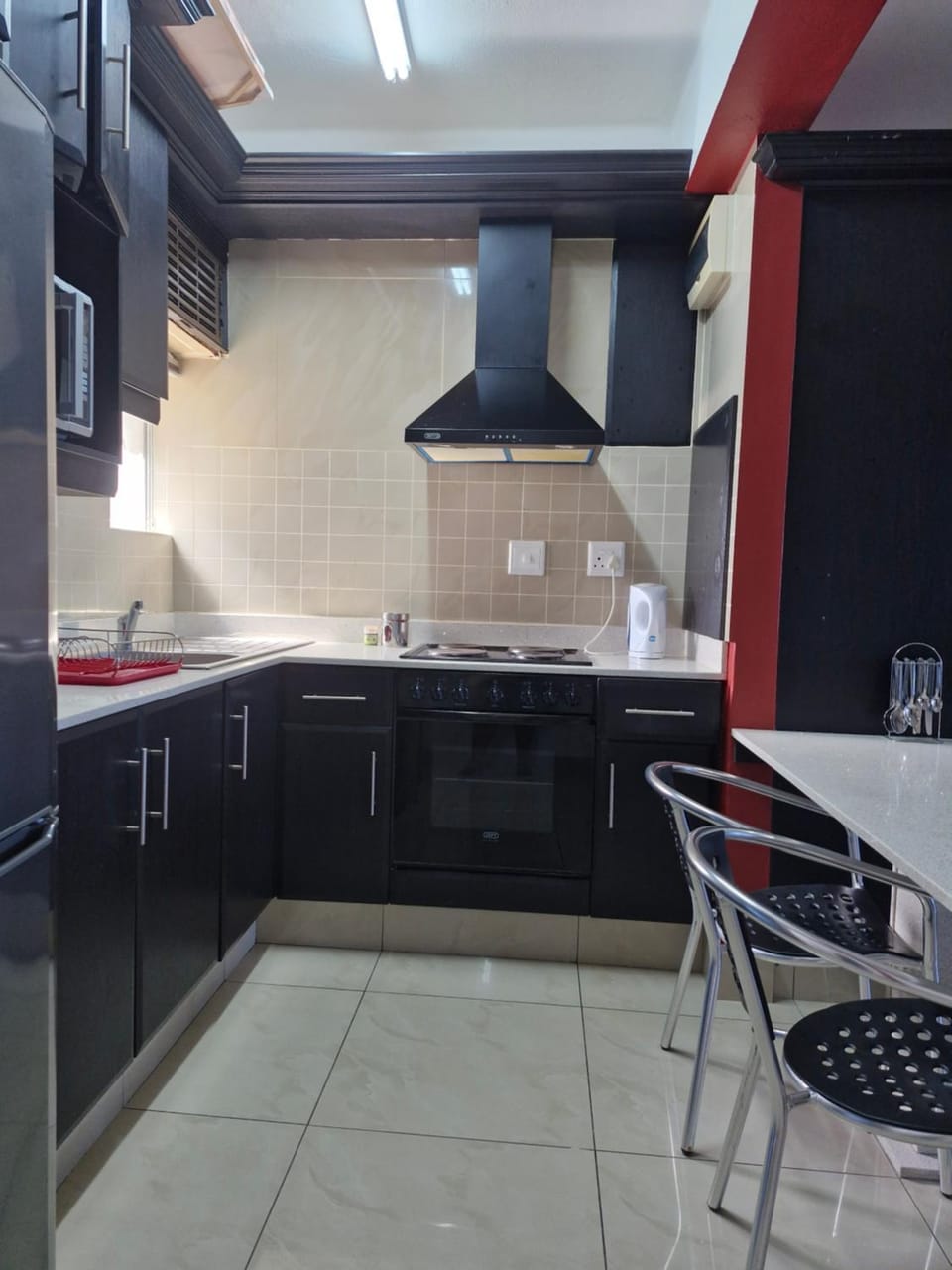 Kitchen or kitchenette, Dining area, microwave, oven, stove