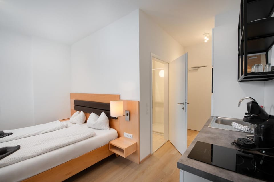 Bed, Bathroom, Kitchen or kitchenette, Photo of the whole room