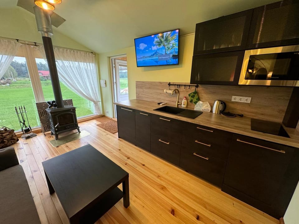 Property building, Kitchen or kitchenette, stove, stove, kitchen, kitchen, air conditioner, air conditioner