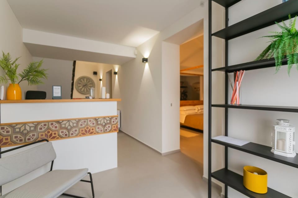 Bed, Living room, Seating area, Bedroom