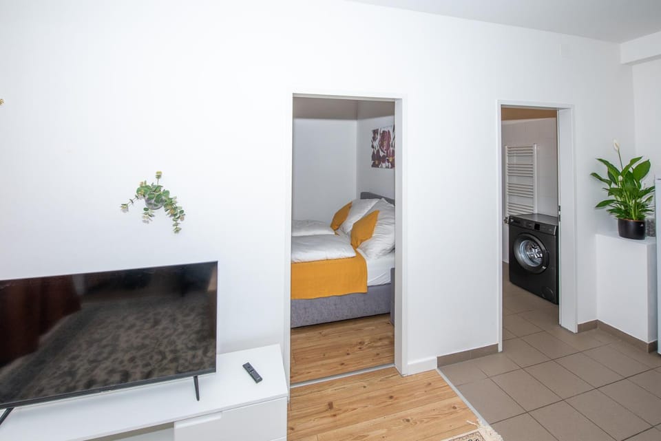 Bed, TV and multimedia, washing machine