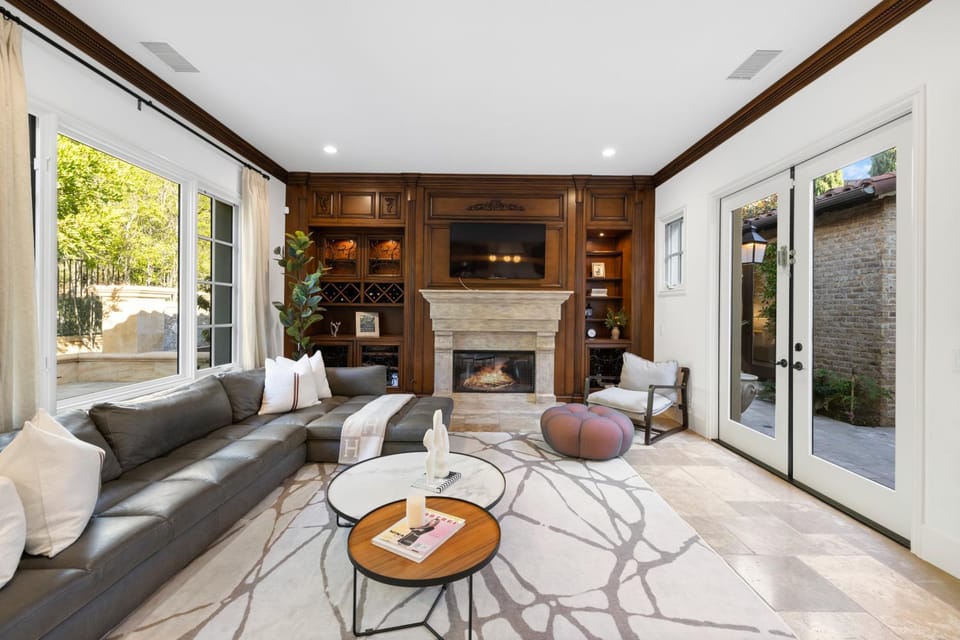 Living room, Seating area, Garden view, fireplace