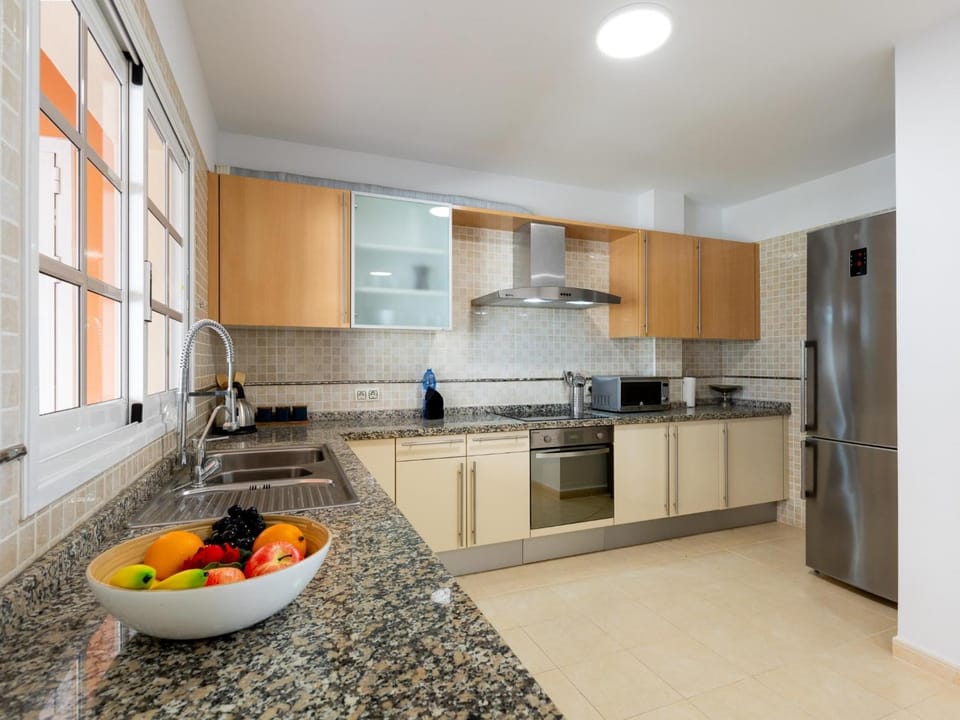 Kitchen or kitchenette, oven, stove