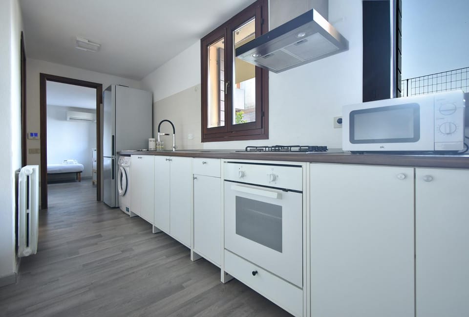 Kitchen or kitchenette, oven, stove