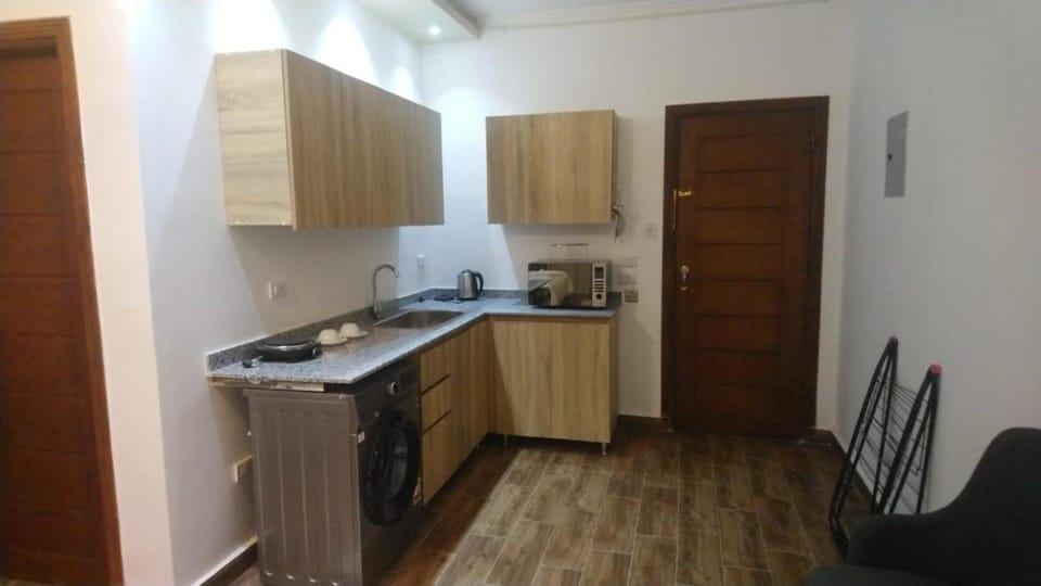 Kitchen or kitchenette, oven