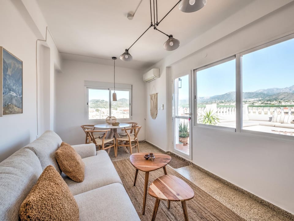 View (from property/room), Living room, Seating area, Dining area, Mountain view, air conditioner
