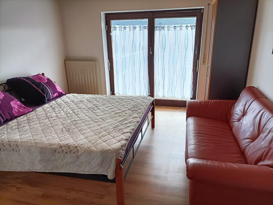 Property building, Living room, Bedroom