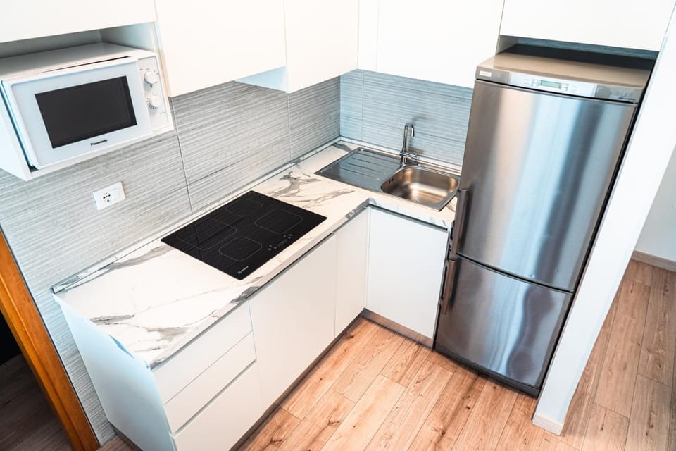 Kitchen or kitchenette, stove