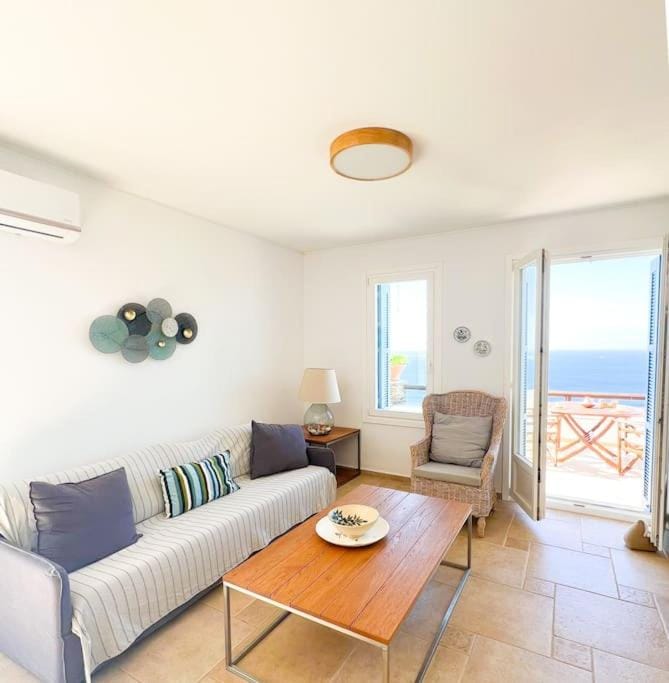 View (from property/room), Living room, Seating area, Sea view