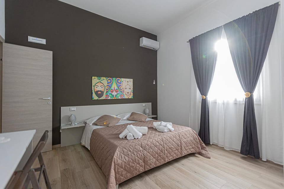 Bed, Photo of the whole room, Bedroom, towels, air conditioner