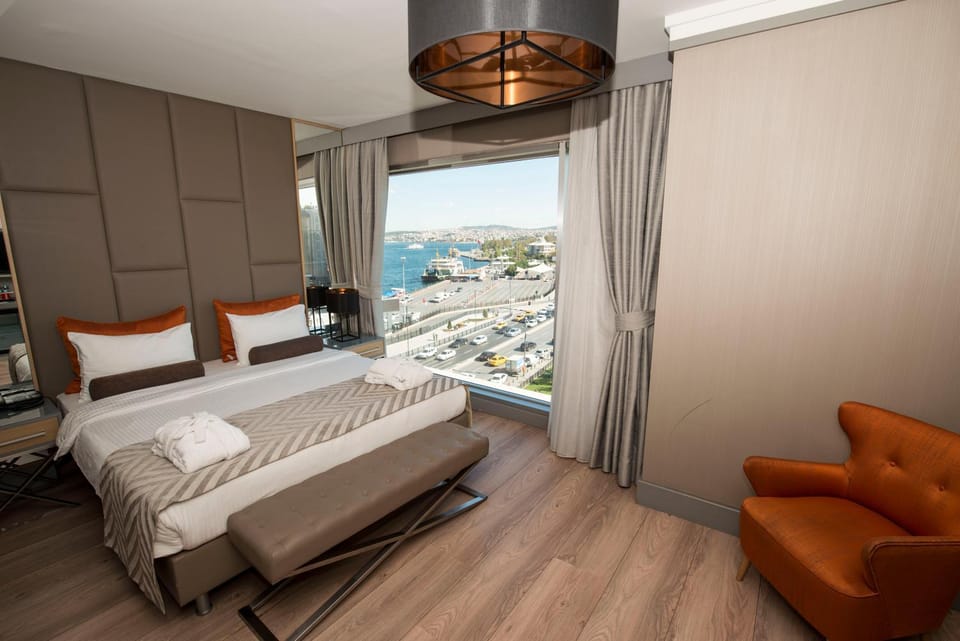 Bed, Seating area, Sea view, Street view