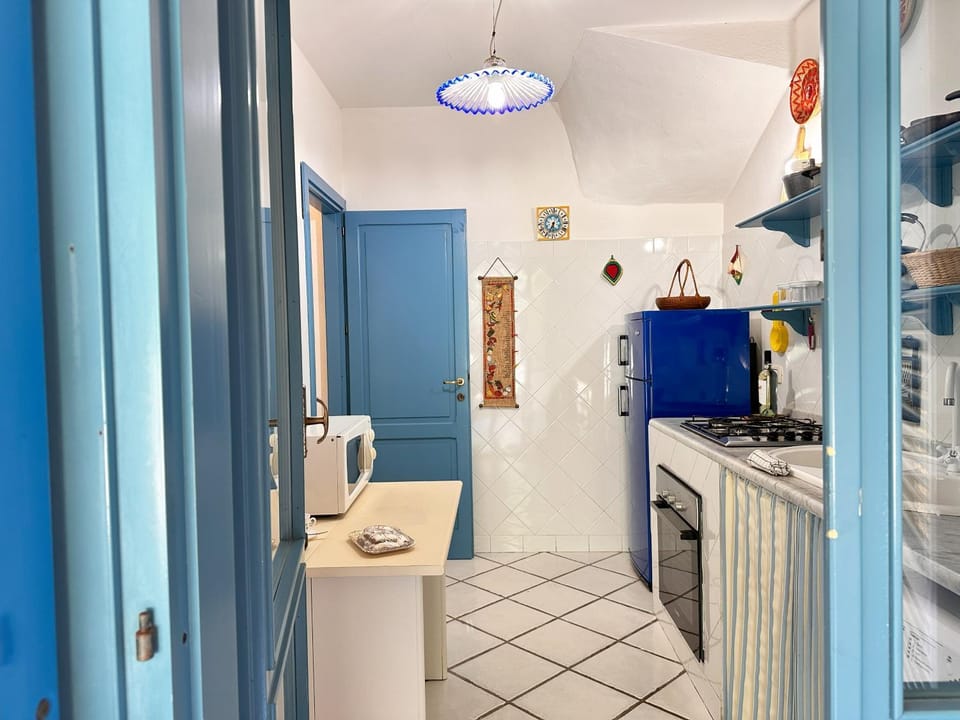 Blue shutters by the beach, Access to private beach House in Sardinia