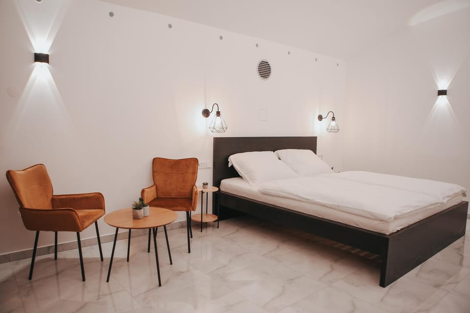 Bed, Seating area, Bedroom
