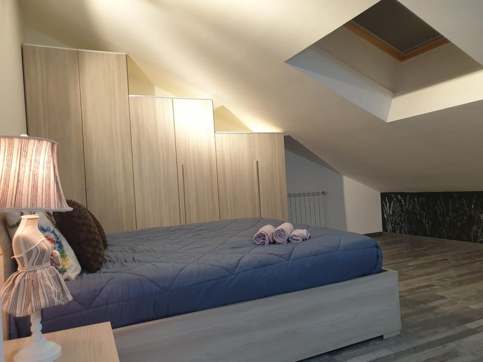 Bed, Photo of the whole room, towels, wardrobe