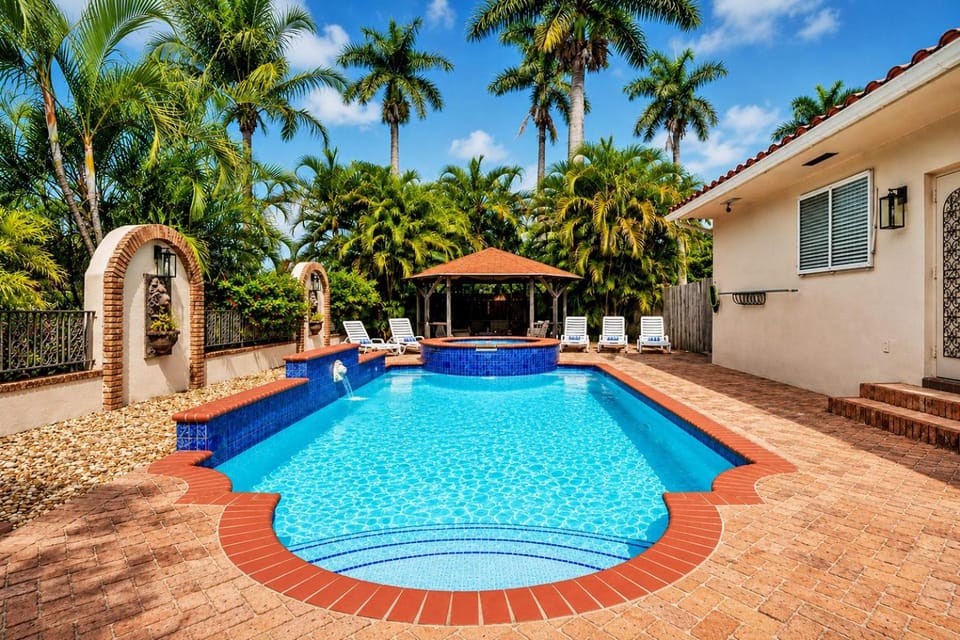 Property building, Patio, Pool view, Swimming pool, sunbed