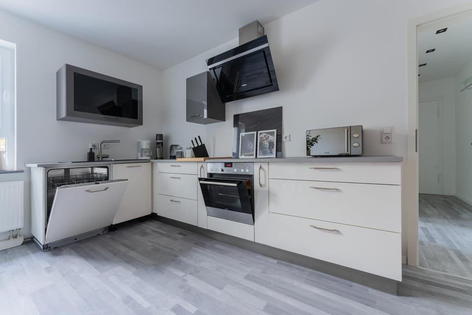Kitchen or kitchenette, Dining area, dishwasher, minibar, stove