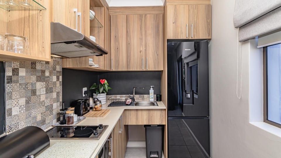 Kitchen or kitchenette, oven, stove, toaster