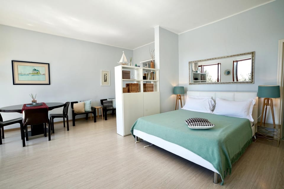 Bed, Living room, Seating area, Bedroom