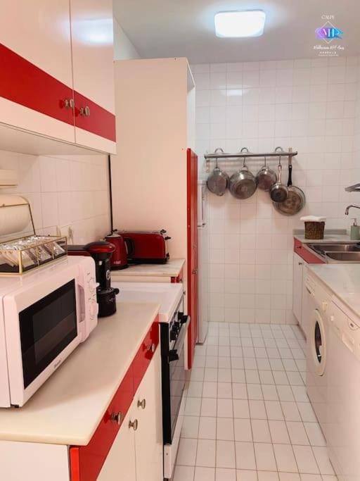 Kitchen or kitchenette, oven, stove, toaster