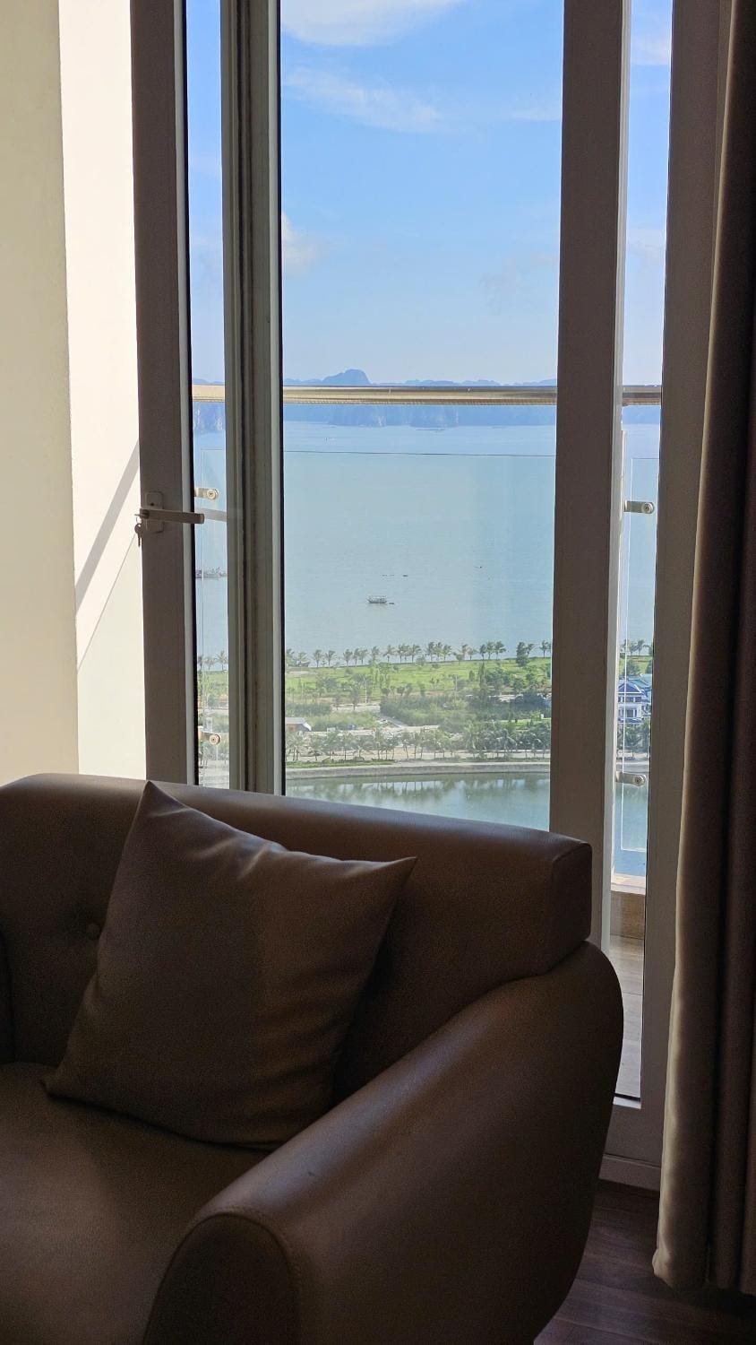 Natural landscape, View (from property/room), Living room, Seating area, Lake view, Sea view