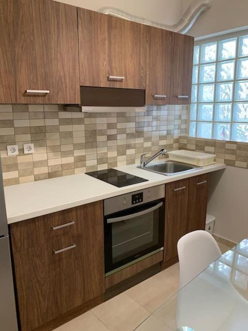 Kitchen or kitchenette, stove