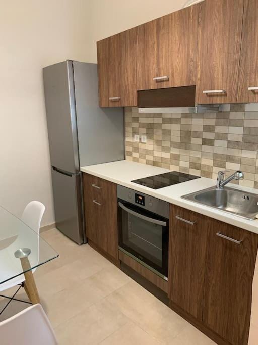Kitchen or kitchenette, oven, stove