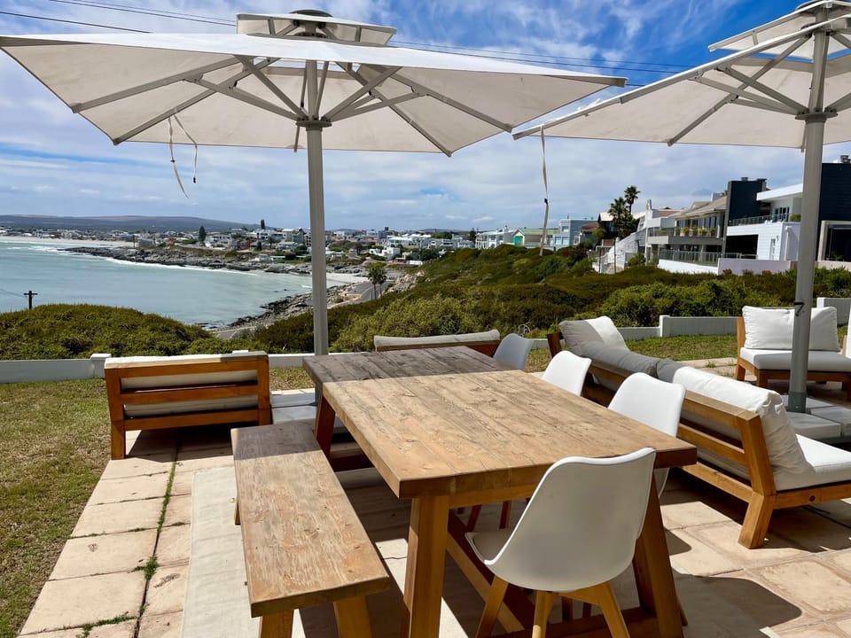Patio, Natural landscape, View (from property/room), Seating area, Dining area, Sea view