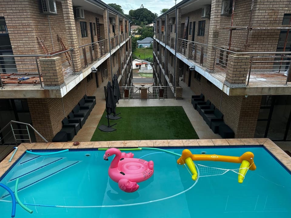 Property building, Day, Evening entertainment, Pool view, Swimming pool