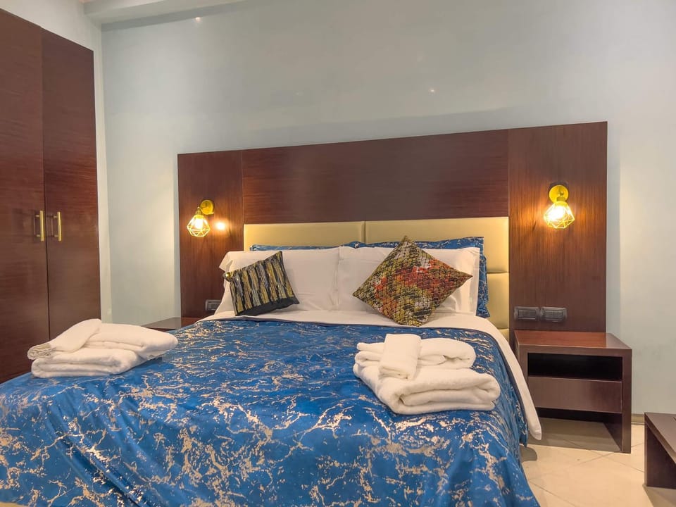 Bed, Photo of the whole room, Bedroom, towels, wardrobe
