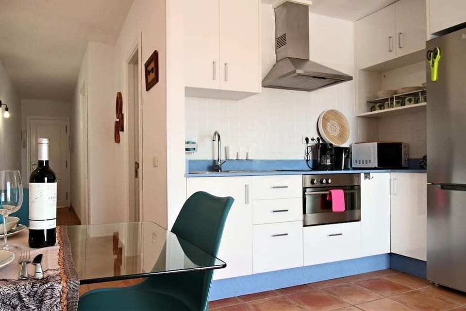 Kitchen or kitchenette, oven, toaster